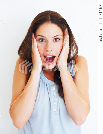 Portrait, surprise and shocked woman in studio isolated on a white background. Wow, omg and face of female person with surprised expression, emoji and unexpected news, announcement or secret gossip. Portrait, surprise and shocked woman in studio isolated on a white background. Wow, omg and face of female person with surprised expression, emoji and unexpected news, announcement or secret gossip. 134171567
