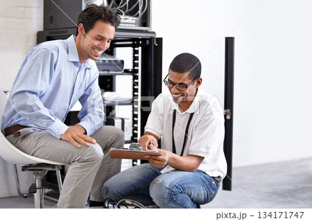 Server room, it support and clipboard with a technician talking to a business man about cyber security. Network, database and contract with a male engineer chatting about information technology Server room, it support and clipboard with a technician talking to a business man about cyber security. Network, database and contract with a male engineer chatting about information technology 134171747