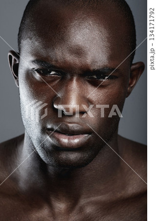 Portrait , serious and black man with skincare, cosmetics and dermatology against a grey studio background. Face, male person and model with beauty, salon treatment and luxury with grooming routine Portrait , serious and black man with skincare, cosmetics and dermatology against a grey studio background. Face, male person and model with beauty, salon treatment and luxury with grooming routine 134171792