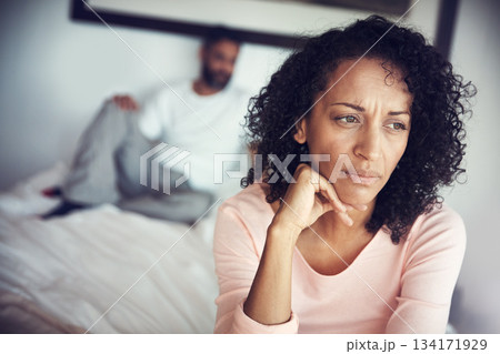 Angry, sad and couple in bedroom for problem, divorce decision and marriage fail or mental health risk. Depression, fight and african woman thinking with partner at home depressed, anxiety or stress Angry, sad and couple in bedroom for problem, divorce decision and marriage fail or mental health risk. Depression, fight and african woman thinking with partner at home depressed, anxiety or stress 134171929