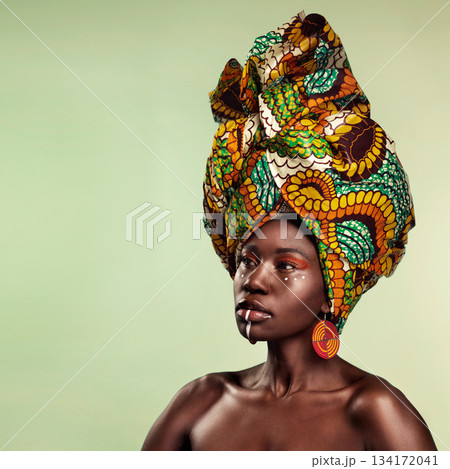 Beauty, black woman and cosmetics with African turban and makeup with mockup. Isolated, green background and young female person thinking with a traditional hair scarf with confidence and culture 134172041