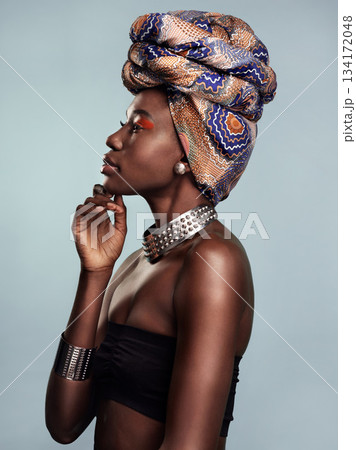 Fashion, head scarf and profile of black woman in studio on gray background with glamour, cosmetics and makeup. Luxury, culture and face of female person in exotic jewelry, African style and beauty Fashion, head scarf and profile of black woman in studio on gray background with glamour, cosmetics and makeup. Luxury, culture and face of female person in exotic jewelry, African style and beauty 134172048