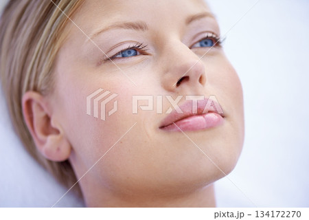 Woman, face closeup and beauty with wellness, peace and content with natural cosmetics and skincare. Facial, self care and spa treatment with young female person with dermatology and cosmetic glow Woman, face closeup and beauty with wellness, peace and content with natural cosmetics and skincare. Facial, self care and spa treatment with young female person with dermatology and cosmetic glow 134172270