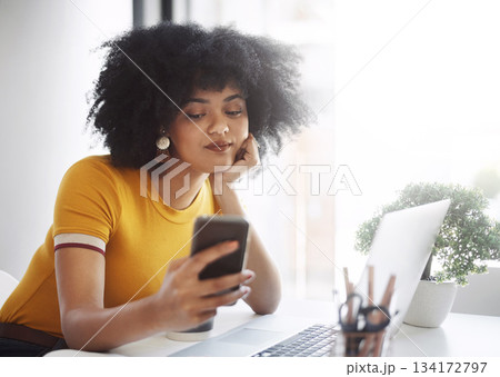 Phone, laptop and bored business woman on social media, browse or texting while working on report or email. Phone, search and female office worker online waiting for text, message or notification Phone, laptop and bored business woman on social media, browse or texting while working on report or email. Phone, search and female office worker online waiting for text, message or notification 134172797