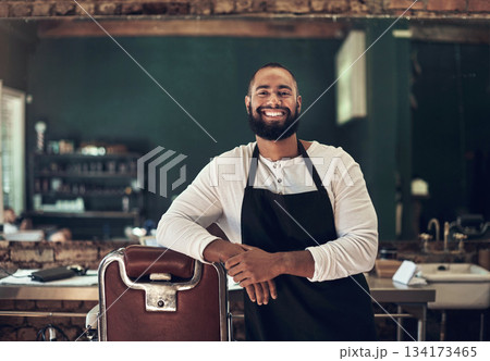 Barber shop, hair stylist and black man portrait of an entrepreneur with a smile. Salon, professional worker and male person face with happiness and proud from small business and beauty parlor Barber shop, hair stylist and black man portrait of an entrepreneur with a smile. Salon, professional worker and male person face with happiness and proud from small business and beauty parlor 134173465