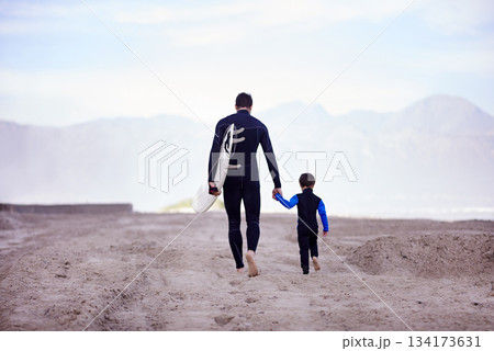 Beach, father and son with surfing lesson, walking and bonding on summer vacation, loving and quality time. Family, parent and dad with boy, male child and kid with surfboard and seaside holiday Beach, father and son with surfing lesson, walking and bonding on summer vacation, loving and quality time. Family, parent and dad with boy, male child and kid with surfboard and seaside holiday 134173631