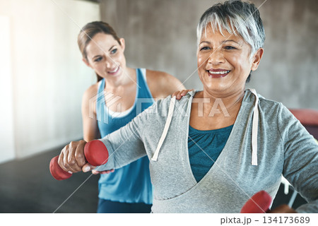 Physical therapy, dumbbell and fitness with old woman and personal trainer for support, health and physiotherapy. Training, weightlifting and coaching with senior patient and female trainer for help Physical therapy, dumbbell and fitness with old woman and personal trainer for support, health and physiotherapy. Training, weightlifting and coaching with senior patient and female trainer for help 134173689