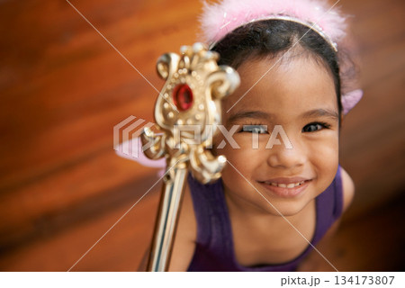 Portrait, fairy and girl with a wand, fantasy and playful with happiness, cheerful and Halloween. Face, female child and kid with joy, princess and magic childhood with costume dress up and youth Portrait, fairy and girl with a wand, fantasy and playful with happiness, cheerful and Halloween. Face, female child and kid with joy, princess and magic childhood with costume dress up and youth 134173807