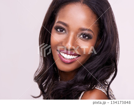 Makeup, face of happy black woman and in studio backdrop. Beauty facial treatment, skincare or dermatology and cosmetics for self care with female model with glow or shine in background. 134173848