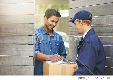 Logistics, customer sign off package from delivery man and crm outdoors at the gate. Ecommerce or courier service, online shopping or product and shipment or exchange between people with signature 134173856