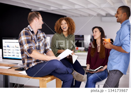 Team laughing, meeting and documents in office for planning, strategy and happiness with support. Group, business people and comic conversation with men, women and diversity for friends at startup 134173987