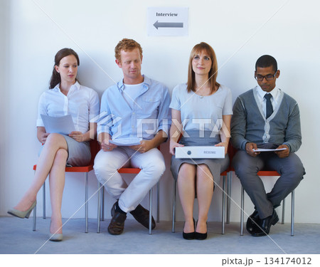 Cv, recruitment and business people in line for job interview, hiring and waiting in a room. Human resources, meeting and candidates in a row in office for onboarding process at a startup company Cv, recruitment and business people in line for job interview, hiring and waiting in a room. Human resources, meeting and candidates in a row in office for onboarding process at a startup company 134174012