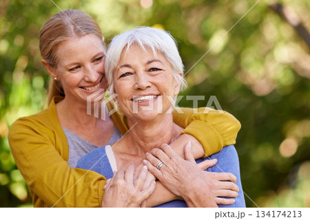 Senior mother, woman and hug outdoor with happiness, love and care in portrait by trees on holiday. Elderly mama, lady and embrace with bond, excited face and support in backyard with summer sunshine 134174213