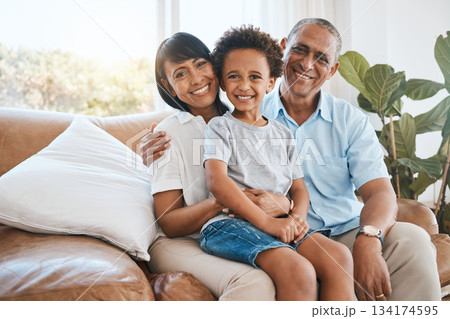 Portrait, grandparents and kid smile in home living room on sofa, bonding or having fun. Family, happiness or child with grandma and grandpa, care or enjoying quality time together on couch in lounge Portrait, grandparents and kid smile in home living room on sofa, bonding or having fun. Family, happiness or child with grandma and grandpa, care or enjoying quality time together on couch in lounge 134174595