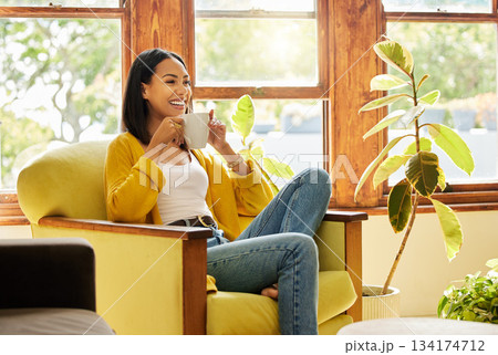 Relax, smile and woman on couch, coffee and peace with happiness, calm and peaceful in lounge. Female on sofa, happy and person in living room, gratitude and weekend break with self care in home Relax, smile and woman on couch, coffee and peace with happiness, calm and peaceful in lounge. Female on sofa, happy and person in living room, gratitude and weekend break with self care in home 134174712
