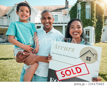 Mother, father and child in property, real estate or billboard of happy family for new home, sold or investment. Portrait of mom, dad and son holding billboard of mortgage asset, homeowner or house 134175083