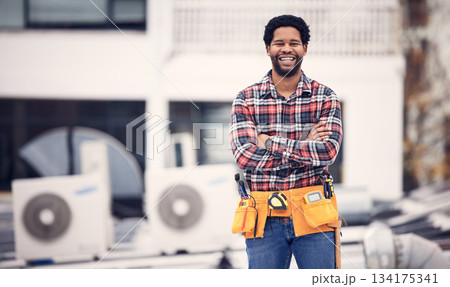 Engineering, portrait and man arms crossed on roof air conditioning, maintenance and technician ac repair. Happy African person, handyman or electrician contractor for aircon or electricity service Engineering, portrait and man arms crossed on roof air conditioning, maintenance and technician ac repair. Happy African person, handyman or electrician contractor for aircon or electricity service 134175341