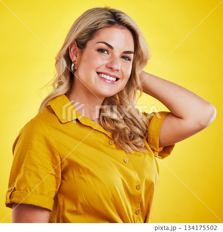 Portrait, smile and carefree with a woman on a yellow background in studio feeling positive. Face, happy and kindness with an attractive young female gen z model looking cheerful against a color wall Portrait, smile and carefree with a woman on a yellow background in studio feeling positive. Face, happy and kindness with an attractive young female gen z model looking cheerful against a color wall 134175502