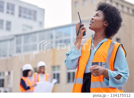 Construction worker, black woman with walkie talkie and inspection of work site, engineering and architecture. Communication, technology and female contractor, building industry and labor outdoor Construction worker, black woman with walkie talkie and inspection of work site, engineering and architecture. Communication, technology and female contractor, building industry and labor outdoor 134175512