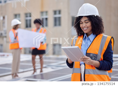 Solar panels, engineering and tablet with woman on roof for planning, renewable energy and leadership. Sustainability, technology and photovoltaic maintenance with female engineer for inspection Solar panels, engineering and tablet with woman on roof for planning, renewable energy and leadership. Sustainability, technology and photovoltaic maintenance with female engineer for inspection 134175514
