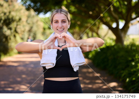 Fitness, heart hands or portrait of happy woman in park for running exercise or workout for body health. Heart sign, self love or active girl athlete runner in sports training for wellness in nature 134175749