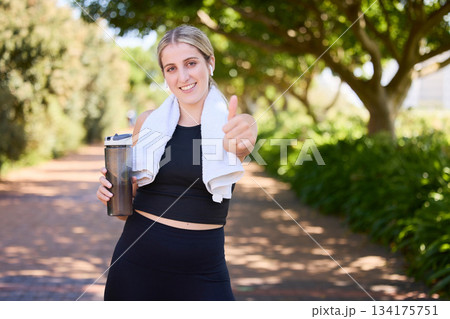 Portrait, happy woman or thumbs up for fitness, nature or healthy running workout exercise with smile. Girl athlete runner smiling showing thumbsup for training, wellness or exercising in a park 134175751