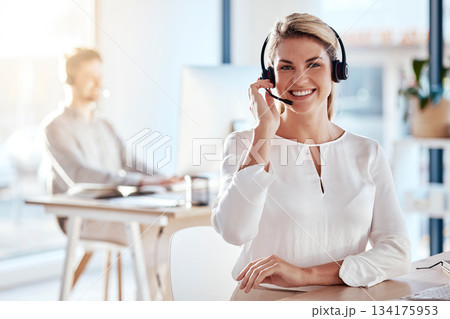 Portrait, customer service and smile with a woman consultant working in her office for after sales support. Call center, contact us and crm with a young female employee consulting using a headset 134175953