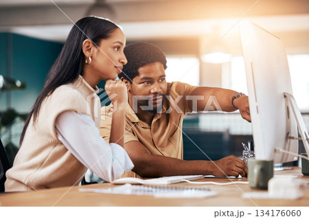 Collaboration, computer and assistance with a business man helping a woman colleague in the office. Teamwork, help and advice with a female employee asking a male coworker to explain a work task Collaboration, computer and assistance with a business man helping a woman colleague in the office. Teamwork, help and advice with a female employee asking a male coworker to explain a work task 134176060