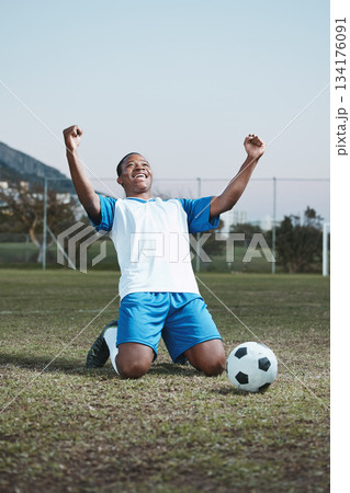 Soccer ball, sports and man celebrate goal on field for competition, fitness or training outdoor. Black male athlete football player, pitch and game celebration for sport achievement, success or win Soccer ball, sports and man celebrate goal on field for competition, fitness or training outdoor. Black male athlete football player, pitch and game celebration for sport achievement, success or win 134176091