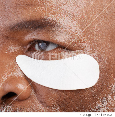 Skin care, eye mask and zoom on black man with professional anti ageing spa treatment with collagen. Dermatology, cosmetic process and face of mature model with patch on eyes for skincare routine. 134176408