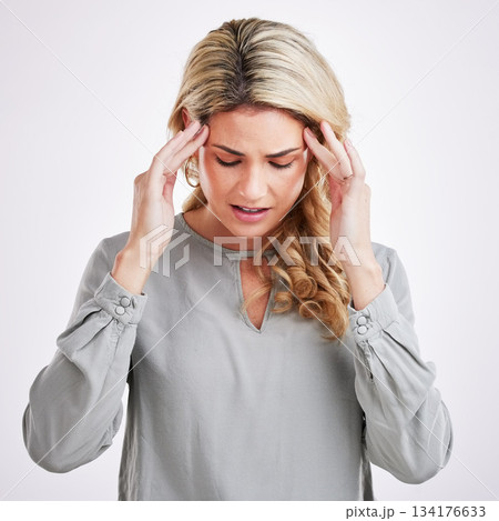 Stress, anxiety and woman in studio with headache, brain fog and pain against grey background. Migraine, depression and female suffering from problem, vertigo and burnout, frustrated and tired Stress, anxiety and woman in studio with headache, brain fog and pain against grey background. Migraine, depression and female suffering from problem, vertigo and burnout, frustrated and tired 134176633