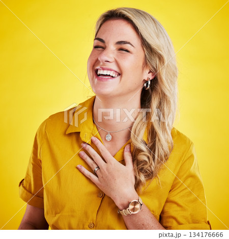 Woman, laughing and happy in studio with joke, comedy or funny reaction against gradient yellow background. Comic, relief and female laugh, relax and meme, good mood and happiness while isolated 134176666
