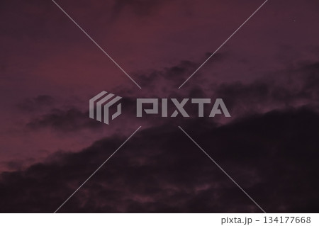 Moody dark purple clouds background at twilight sky Moody dark purple clouds background at twilight sky 134177668