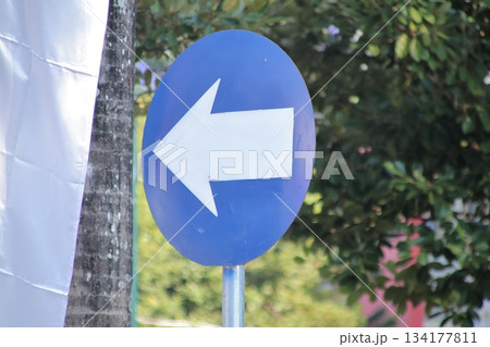 Mandatory Traffic Sign Directing Vehicles to Turn Left Mandatory Traffic Sign Directing Vehicles to Turn Left 134177811