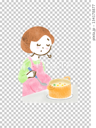圖：一位孕婦圍著圍裙煮飯，表情疲憊。 134178877