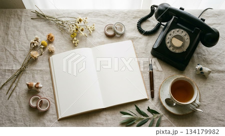 Notebook with Vintage Phone and Tea Cup 134179982