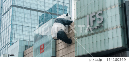 Panda statue climbing IFS building or International Finance Centre is a shopping mall located near Chunxi Road Pedestrian street, located in the Jinjiang District. 1 November 2025, Chengdu, China 134180369