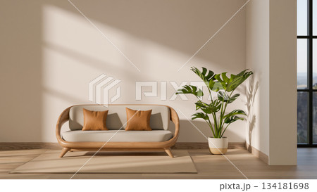 A green houseplant in pot aside sofa couch on carpet over wooden parquet floor in modern living room 134181698