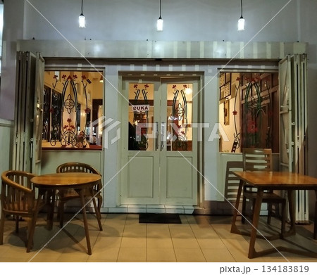 Cozy Cafe Entrance at Night 134183819