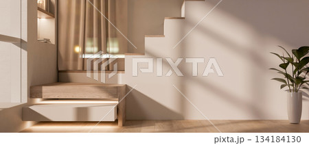 Sunlight shining on white wall of staircase and potted plant on wooden parquet floor in modern house 134184130