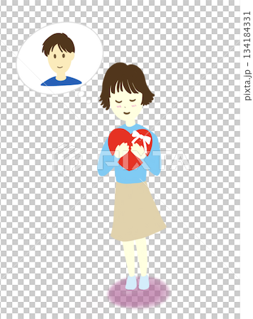 彼を想って頬を赤らめながらプレゼントを抱きしめる女の子 134184331