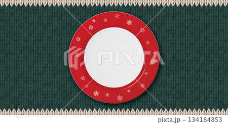 Top view of empty white dish with with red border and snowflake decoration placed on a green placemat background 134184853