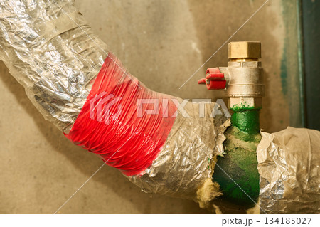 Isolated water supply.Valve shutting,pipes wrapped in basement 134185027