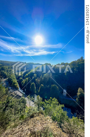 Esch-sur-Sure, Wiltz, Grand-Duche de Luxembourg, September 07, 2025, Sundrenched precipice offering Esch-sur-Sure, Wiltz, Grand-Duche de Luxembourg, September 07, 2025, Sundrenched precipice offering 134185071