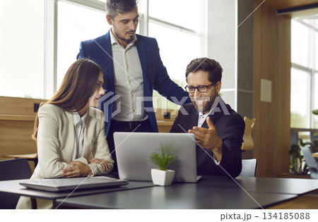 Business people diverse group talk at laptop, coaching culture to build winning business team 134185088