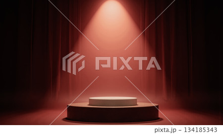 Round platform with glowing spotlight minimalist stage in red curtain background dramatic product placement emphasis clean design 134185343