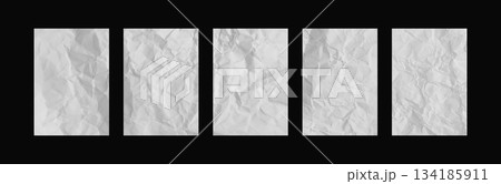 A realistic set of wrinkled white paper sheets with a recycled effect, on a black background. 134185911