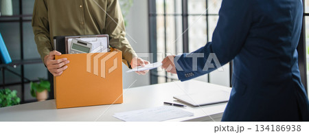 A male employee quits his job. 134186938