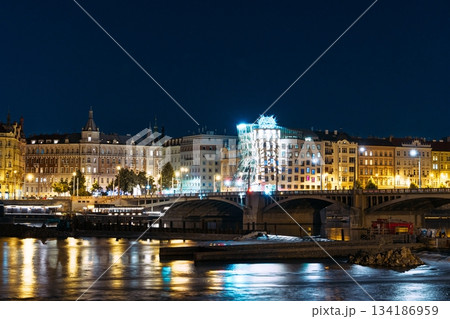 Nighttime Splendor Illuminated Skyline of Prague, Czech Republic reflecting on the Vltava 134186959