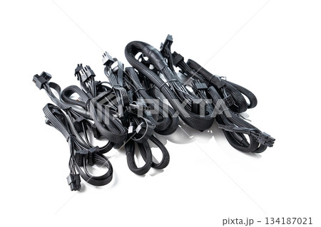Black Computer Power Supply Cables Isolated on White Background for PC Building. Modern 134187021
